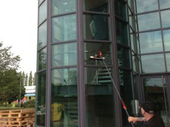 Close up view of office building being cleaned