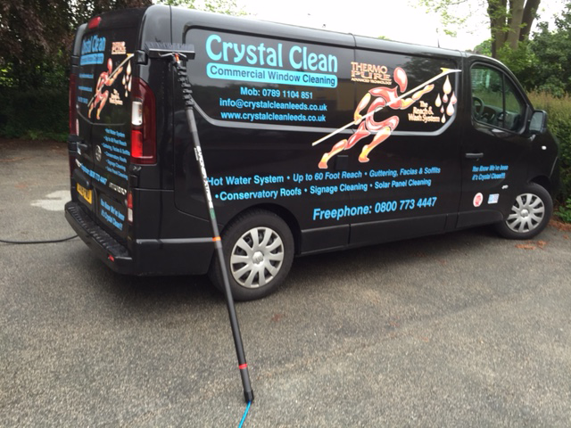 Side view of Crystal Clean Van